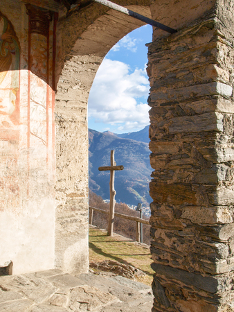Sementina, Switzerland - december 9, 2016: Church of St. Bernard in the chestnut on Mornera. Ancient Romanesque church, in a tight angle but enriched with frescoes depicting the "Madonna del Latte".のeditorial素材