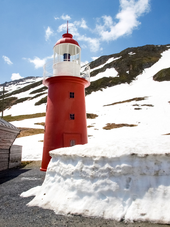 The lighthouse at Oberalp Pass, a reproduction of Unter feuer of Hoek van Holland, bridging from the source to the mouth of the Rhine.の写真素材
