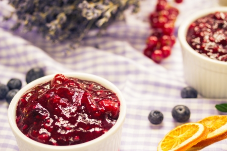 Red fruit compote with custardの写真素材