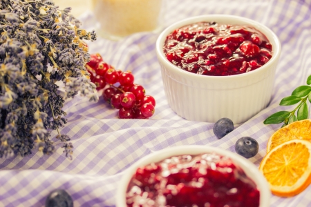 Red fruit compote with custardの写真素材