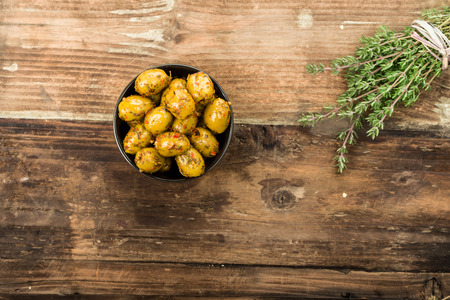 Olives, marinated with fresh herbs in oilの写真素材
