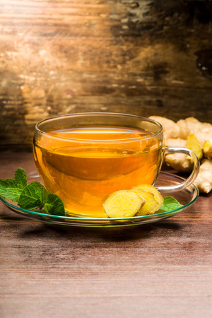 Freshly brewed ginger tea with mintの写真素材