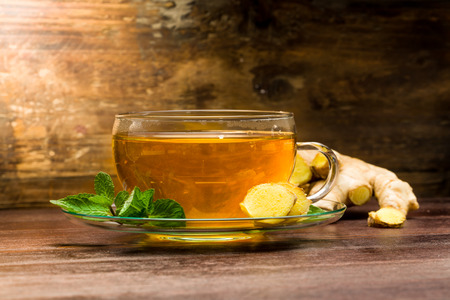 Freshly brewed ginger tea with mintの写真素材