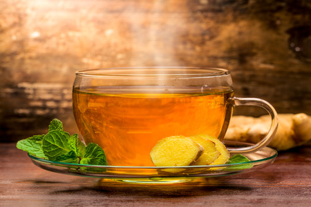 Freshly brewed ginger tea with mintの写真素材
