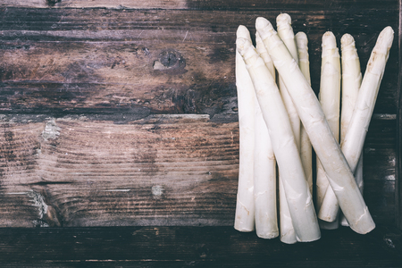 Fresh white asparagus, served on a backgroundの写真素材