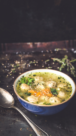 fresh meatball soup in bowl on dark background, dark backgroundの写真素材