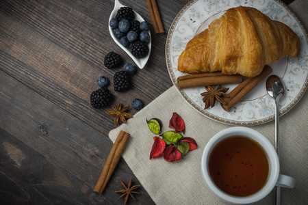 Breakfast with croissants, leaves. Flat lay, top viewの写真素材