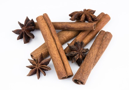 cinnamon stick and star anise spice isolated on white background closeup