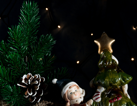 Christmas holiday, a picture of a Christmas tree without ornaments in a pot with Christmas decorations. christmas cardの写真素材