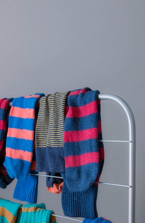 Color socks on the dryer close up.