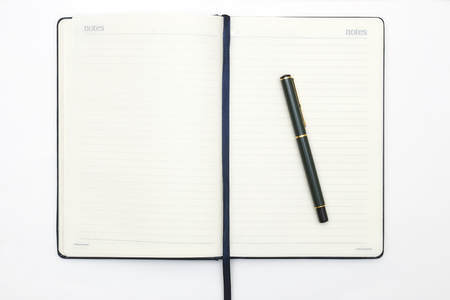 Notebook and pencil on white background. Abstract background for painting, drawing and sketching.
