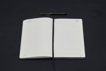 Office dark table. Empty booklet layout, brochure, diary, business portfolio mockup design template...