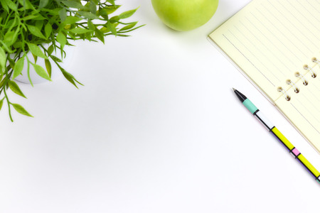 concept of recording your daily affairs. Notepad on a white background. Copy space layoutの写真素材