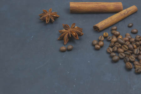 coffee beans loose in the corner of the background. on a dark background. view from above. copy space.の写真素材