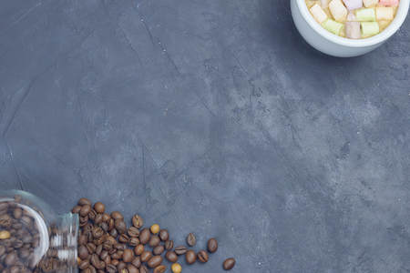 roasted coffee beans poured from a glass jar. angular placement of the coffee object.の写真素材