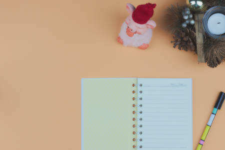 Notepad for text on pink table with copy space. Education and office conceptの写真素材