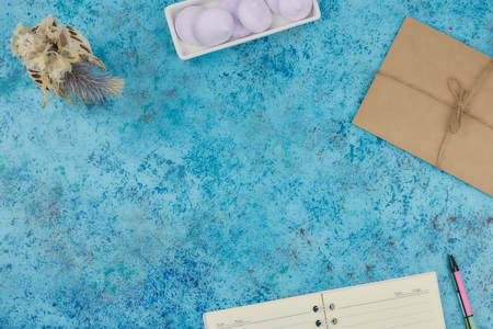 Notepad for text on pink table with copy space. Education and office conceptの写真素材