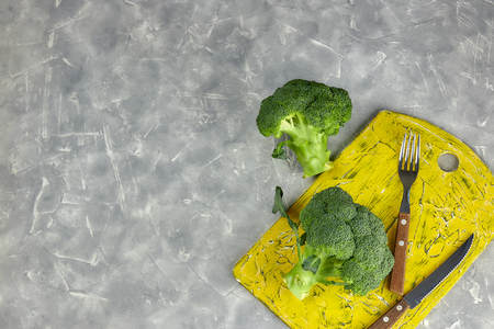 two heads of healthy salad. fresh green broccoli. horizontal view of green vegetable flower. healthy diet.の写真素材