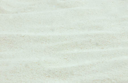 the texture of the beach sand is yellow. sandy.の写真素材
