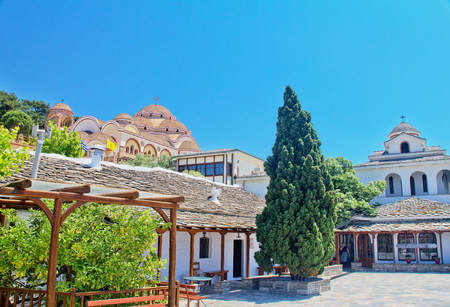 View of the monastery of Archangel Michael in clear weather, Thassos island, Greeceの写真素材