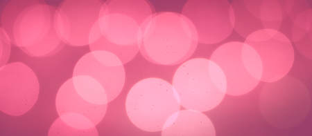 Trending photography on the theme of actual colors for this season-a shade of orange. Blurred abstract orange background with beautiful bokeh effect.の写真素材