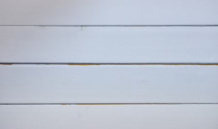 white wood texture background of planks. the background of a wooden wall. space for text.