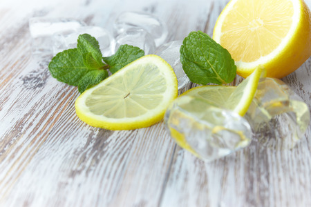 cut lemon on wooden table large plan. horizontal view. citrus fruit.の写真素材