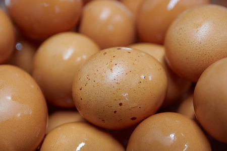 background of yellow chicken eggs. yellow eggs closeup. macro photography.の写真素材