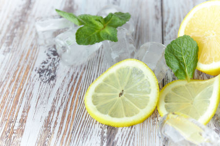 cut lemon on wooden table large plan. horizontal view. citrus fruit. copy space.の写真素材