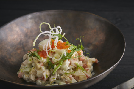 Traditional Russian Christmas and New Year's salad Olivier . Selective focus. copy space. horizontal viewの写真素材