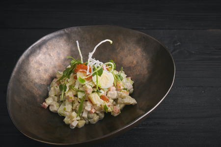 Traditional Russian Christmas and New Year's salad Olivier . Selective focus. copy space. horizontal viewの写真素材