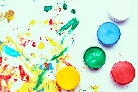 a child draws. a child's drawing inks, finger paints, hand printsの写真素材