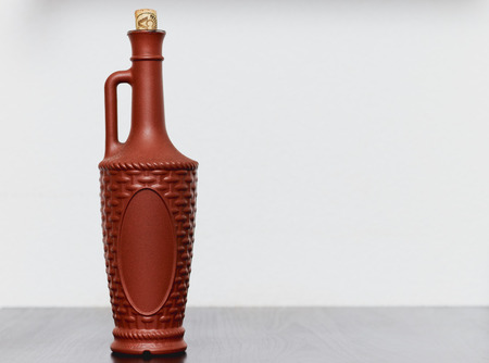 Clay bottle isolated on white background.の写真素材