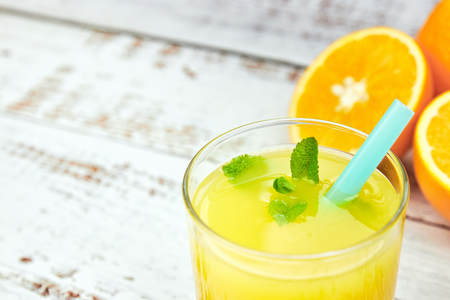 Still Life Glass of Fresh Orange Juice on concrete background with filter.の写真素材