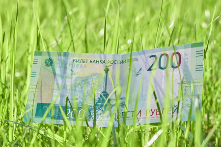 New Russian Banknote Two hundred rubles. Cash paper green money. Boke backgroundの写真素材