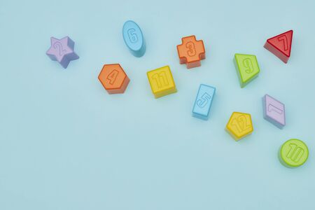 Top view on children's toys on a blue background. Children's toys on the table. concept for advertising toys for children. Copy space.の写真素材