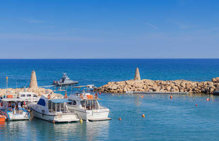 Cyprus Protoras October 11, 2021. different types of yachts and boats on the dock in the bay in clear weather in Cyprus. concept of sea transport.のeditorial素材