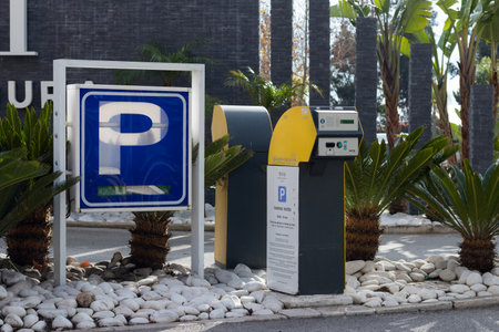 Portugal, Vilamoura, 01 02 2023: Cash terminal for payment in the parking lot. payment for a parking space.のeditorial素材