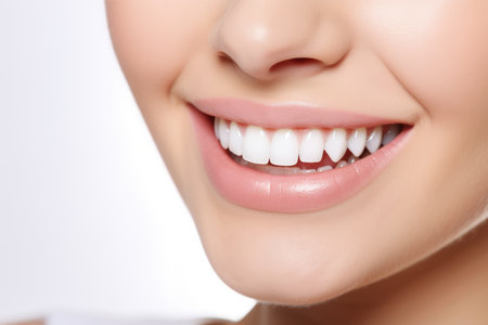 A Close-Up of a Womans Smile with White Teethの素材