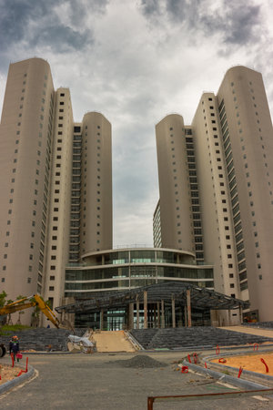 Beautiful multistorey building against the background of clouds