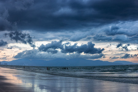 Beach with beautiful rain cloudsの写真素材