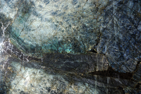 Natural stone with glitter and streaks is called Labradorit Big Blue.の写真素材