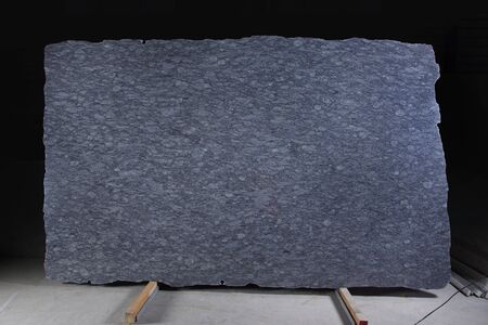 A large slab of natural stone in blue is called granite Orissa Blue.の写真素材