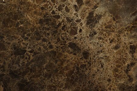 A slab with a texture of natural brown marble with a beautiful pattern, called Emperador Dark.の写真素材