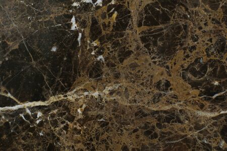 The texture of natural dark brown marble with light veins is called Emperador Darkの写真素材