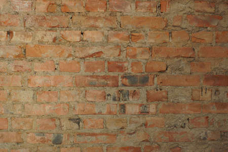Old red brick wall in the house.の写真素材