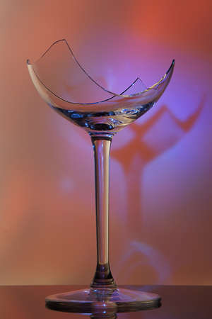 Broken glass for wine, only the bottom on the leg remains.の写真素材