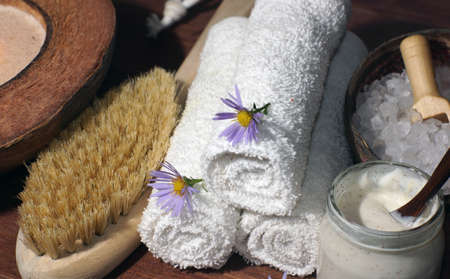 Jar of scrub on the table with spa set close up.の写真素材