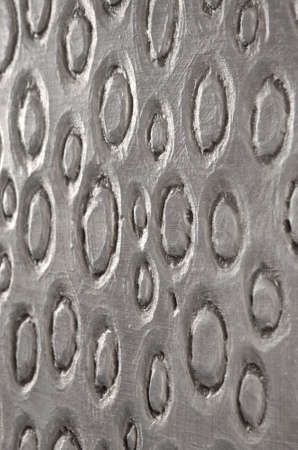 Ovals pressed into white paint and dried, side view.の写真素材