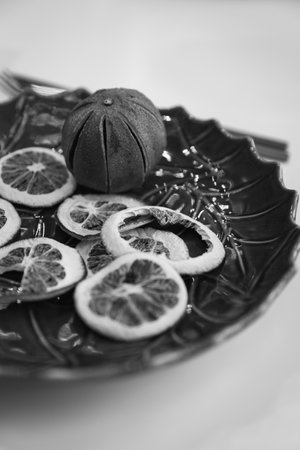 Natural Christmas decorations are laid out on a trayの写真素材